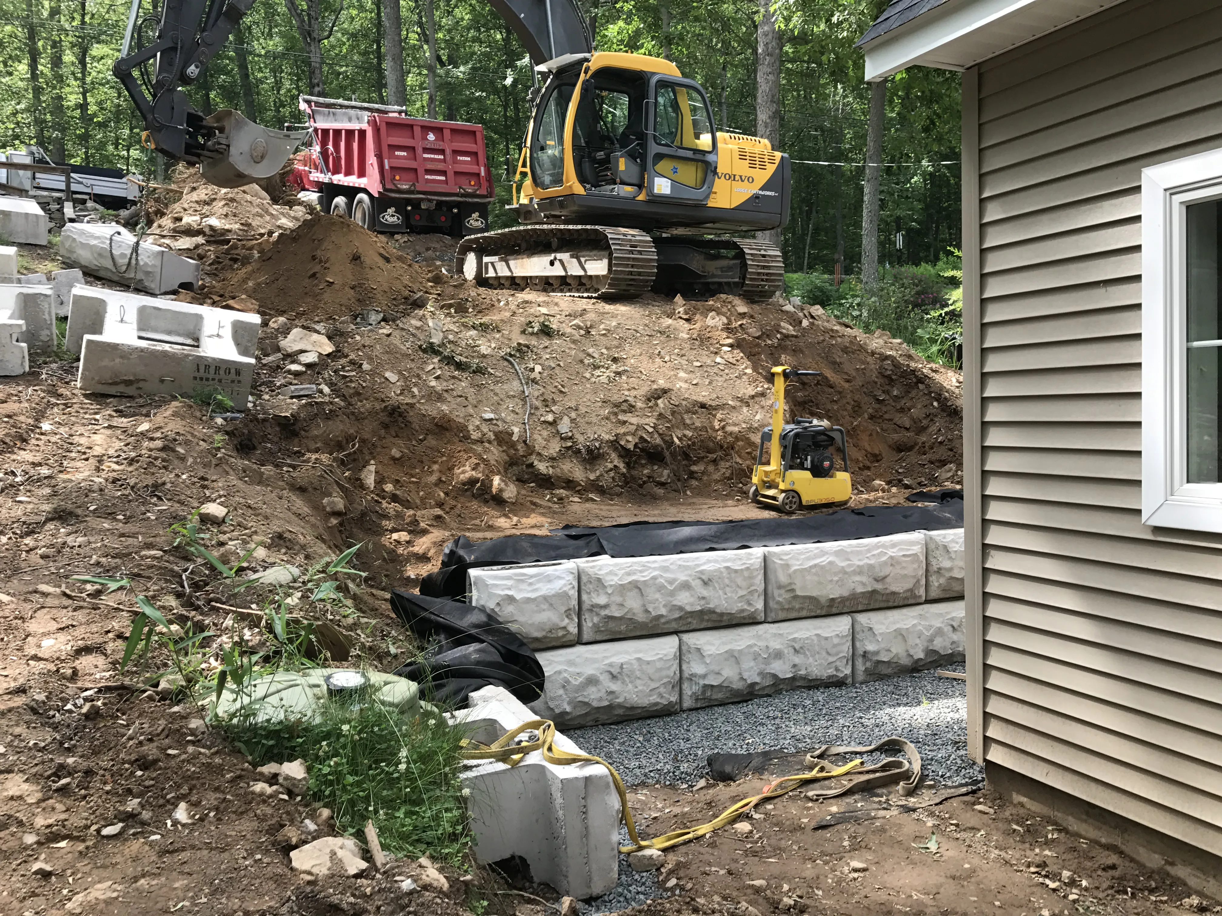 The owner-operator of Lodge Earthworks, Rob Lodge, operating a piece of heavy equipment or showcasing a project he has worked on.