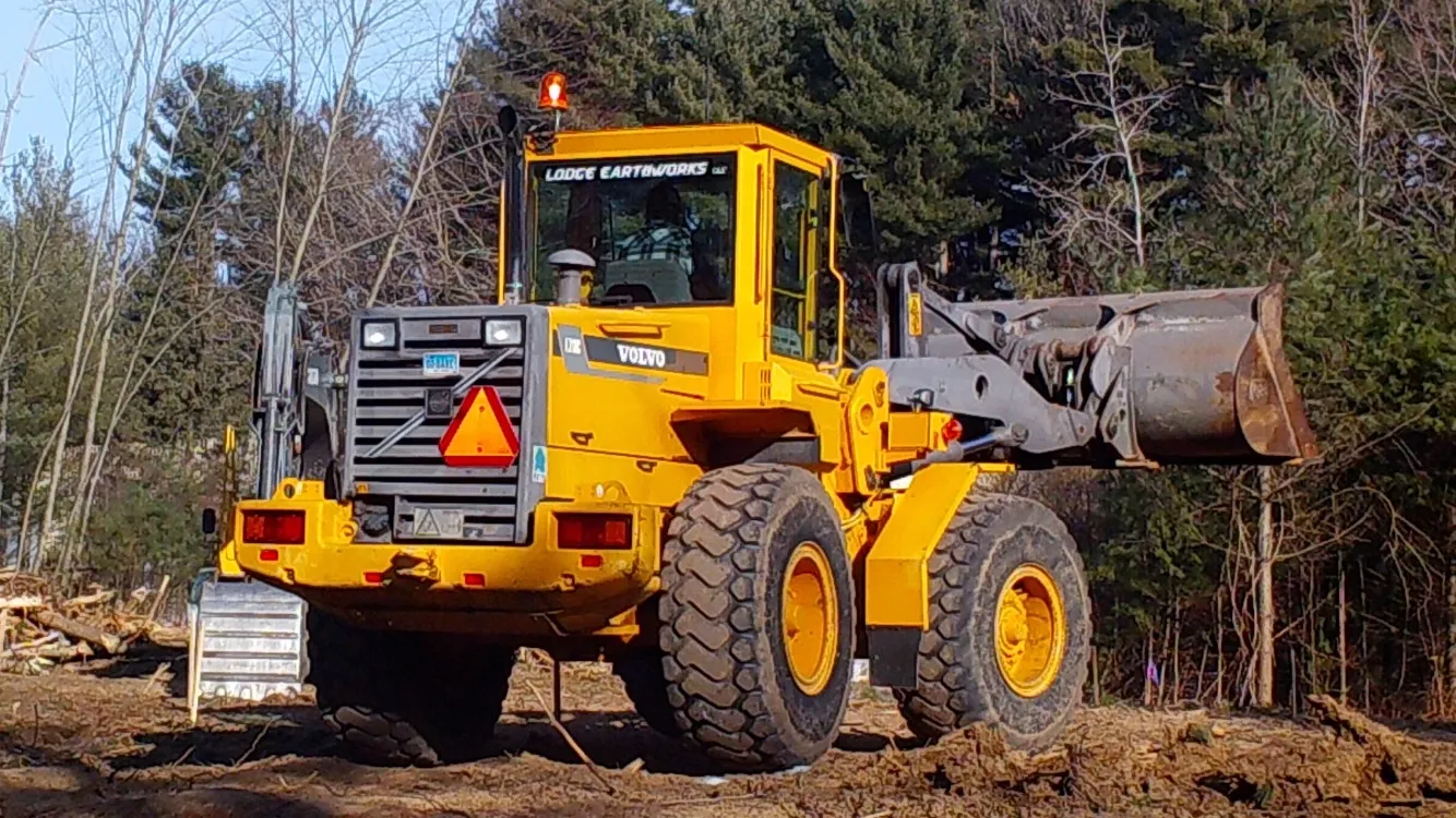 The owner-operator of Lodge Earthworks, Rob Lodge, operating a piece of heavy equipment or showcasing a project he has worked on.