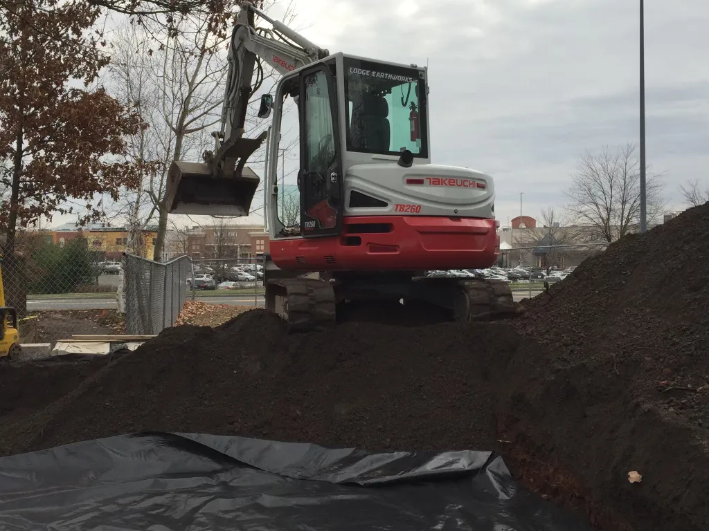 The owner-operator of Lodge Earthworks, Rob Lodge, operating a piece of heavy equipment or showcasing a project he has worked on.